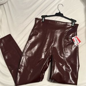 Brand New With Tags! Spanx faux patent leather leggings in ruby red side large